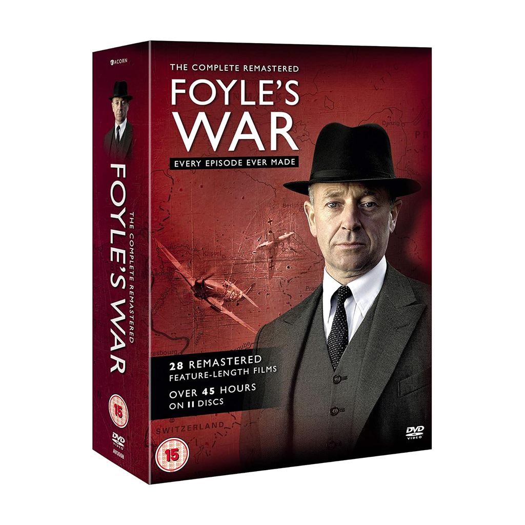 Foyle’s War Complete Collection DVD Box Set – Cover image featuring Michael Kitchen as Detective Chief Superintendent Christopher Foyle. Foyle in Action Scene – A still of DCS Foyle investigating a crime. Wartime Britain Setting – A scene depicting the 1940s historical backdrop of the series. Foyle with Supporting Characters – A group shot including Foyle’s team members Sam Stewart and Paul Milner. Remastered Edition Features – Display of the improved picture and sound quality compared to original releases.